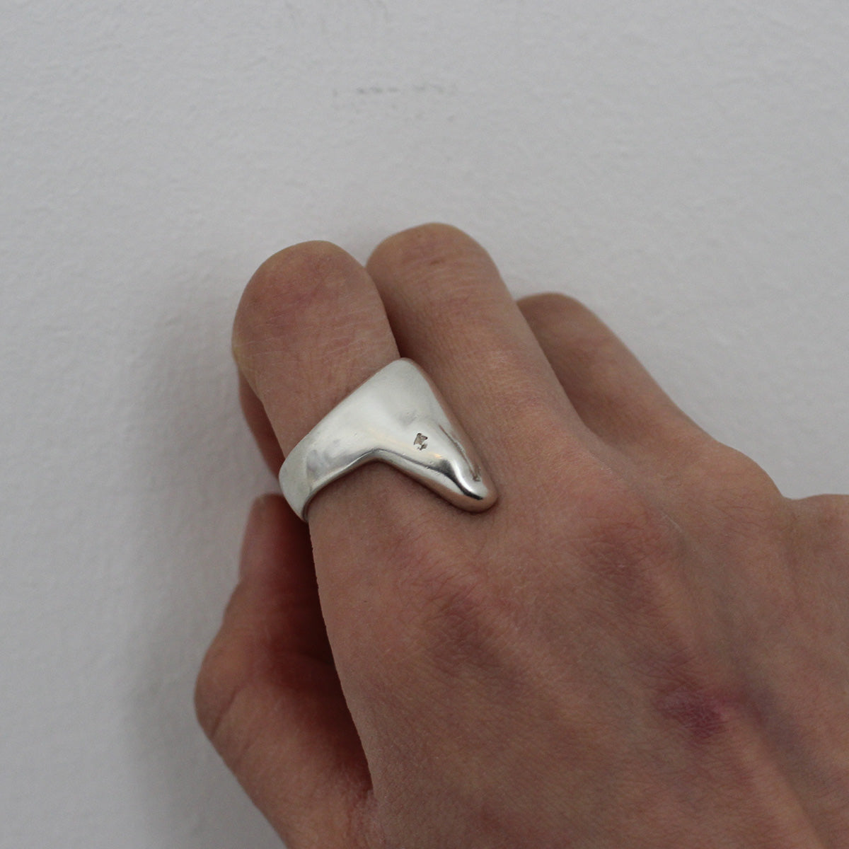Fossil Silver Ring on a finger
