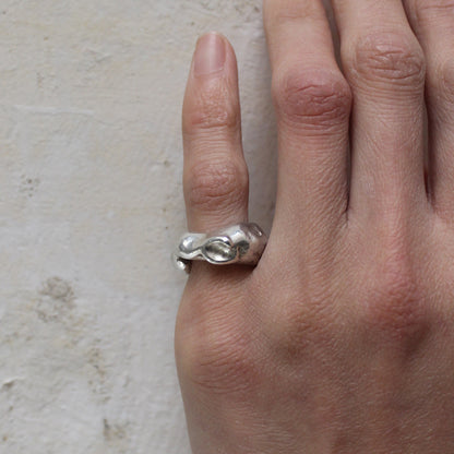 Meteorite Silver Ring on a little finger