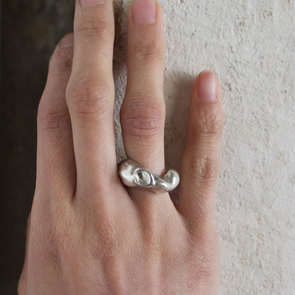 Meteorite Silver Ring on a womans finger